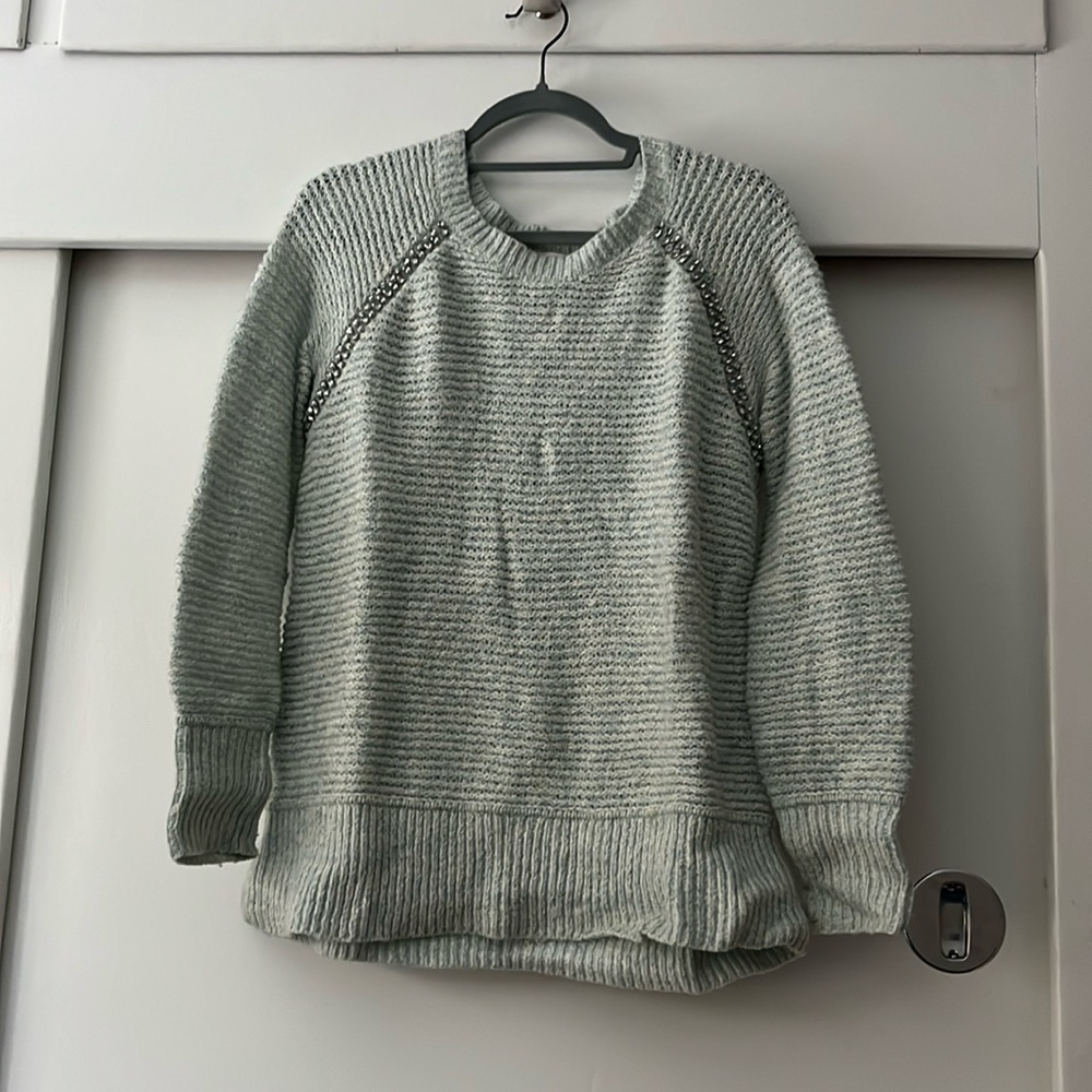 Guc blue heather soft sweater with sparkly detail. Sleeping on snow